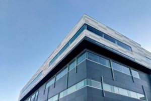 What is a rainscreen cladding system and what are its advantages?